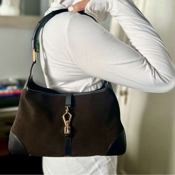 Gucci Handbags - Gucci “Jackie” Vintage Bag.  Brown suede, bamboo handle, and rare crab clasp.
